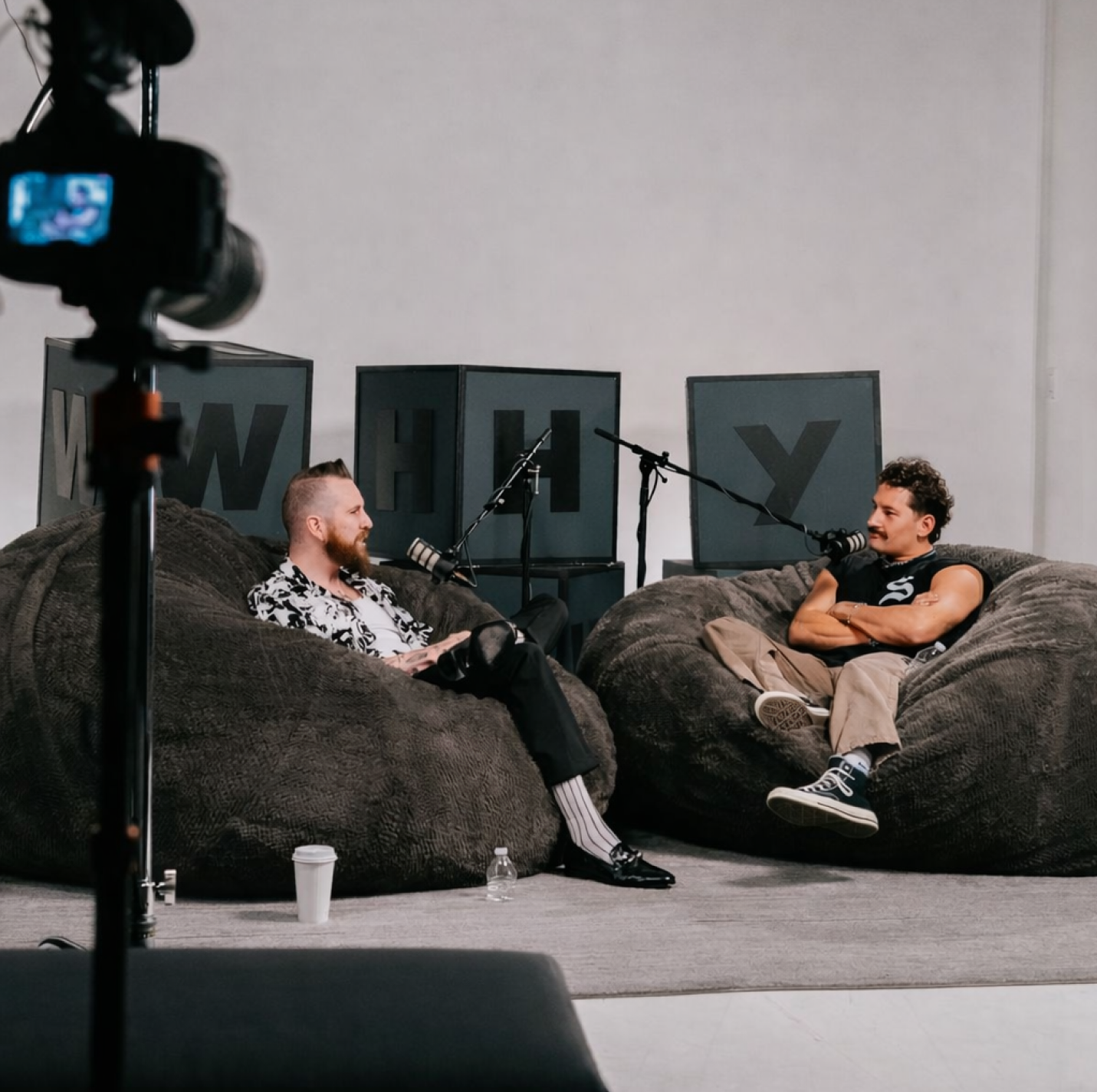 This image says about that Takees Cowork provides a podcast studio